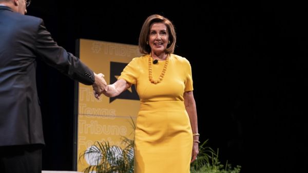 Speaker of the House of Representatives, Nancy Pelosi is greeted on stage by Texas Tribune CEO, Smith at The Texas Tribune Festival on September 28, 2019 in Austin, Texas. (AFP/ File Photo)