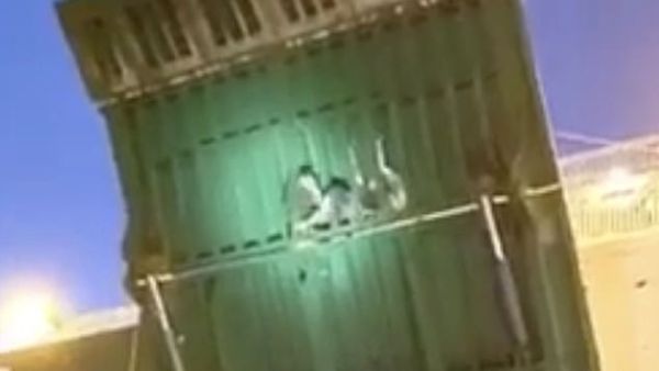 Stowaways were spotted clinging onto the gangway as ferry reached Malaga. (Video Screenshot)