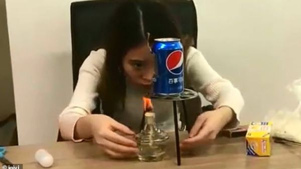 Ms Yeah, a blogger from China, released a video of her making popcorn with a tin can and an alcohol lamp in 2017. The woman has faced controversy after a girl died copying the video. (YouTube)