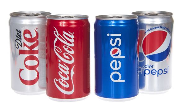 One can of coke and diet coke next to one can of pepsi and diet pepsi. (Shutterstock/ File Photo)