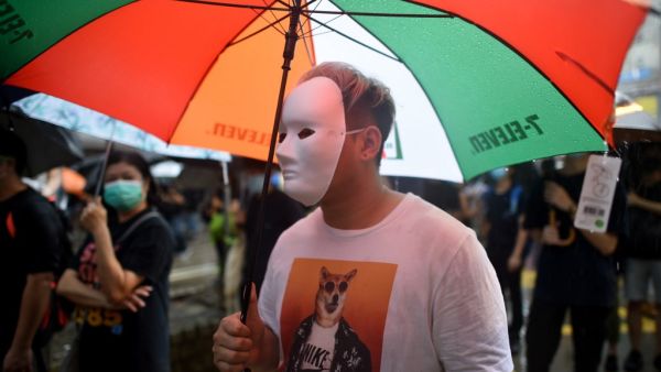 People gather for a rainy protest march in the Causeway Bay shopping district of Hong Kong on October 6, 2019. (AFP/ File Photo)