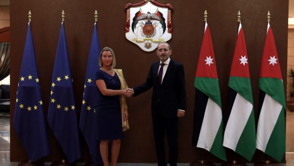 Jordanian Foreign Minister Ayman Safadi welcomes the High Representative for Foreign Affairs and Security Policy of the European Union (EU) Federica Mogherini in Amman on October 7, 2019. (Khalil MAZRAAWI / AFP)
