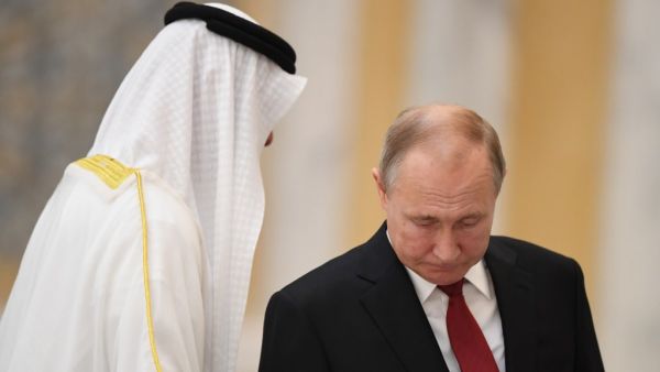 Russian President Vladimir Putin (R) is received by Sheikh Mohamed bin Zayed al-Nahyan, Crown Prince of Abu Dhabi, during an official welcoming in the Emirati capital's Al-Watan presidential palace on October 15, 2019. (KARIM SAHIB / AFP)