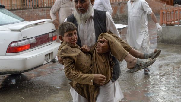 At least 28 worshippers were killed and dozens wounded by a blast inside an Afghan mosque during Friday prayers (AFP)