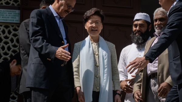 Hong Kong's Chief Executive Carrie Lam (C) exits the Kowloon Mosque, or Kowloon Masjid and Islamic Centre, in the Tsim Sha Tsui district in Hong Kong on October 21, 2019.  (AFP/ File Photo)