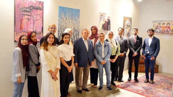 Saudi Arabia’s permanent representative to the UN Abdallah Al-Mouallimi, center, with the exhibition’s volunteers and guests on the opening day. (Photo/Supplied/ Arab News)) Saudi Arabia’s permanent representative to the UN Abdallah Al-Mouallimi, center, with the exhibition’s volunteers and guests on the opening day. (Photo/Supplied/ Arab News))