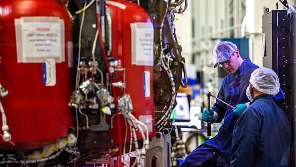 Employees of SpaceX work on the Crew Dragon reusable spacecraft. (AFP/ File Photo)
