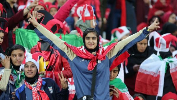 Iranian female fans cheer for their team during the second leg of the AFC Champions League final football match between Iran's Persepolis and Japan's Kashima Antlers on November 10, 2018, at the Azadi Stadium in Tehran (AFP /ATTA KENARE)