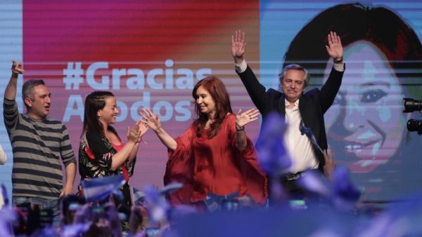 Argentina’s President-elect Alberto Fernandez, right, and Vice President Cristina Fernandez wave to supporters at the party’s headquarters in Buenos Aires on Sunday. (Alejandro Pagni / AFP/Getty Images)