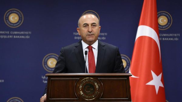 Turkish Foreign Minister Mevlut Cavusoglu gives a press conference in Ankara on July 25. (AFP/ File Photo)
