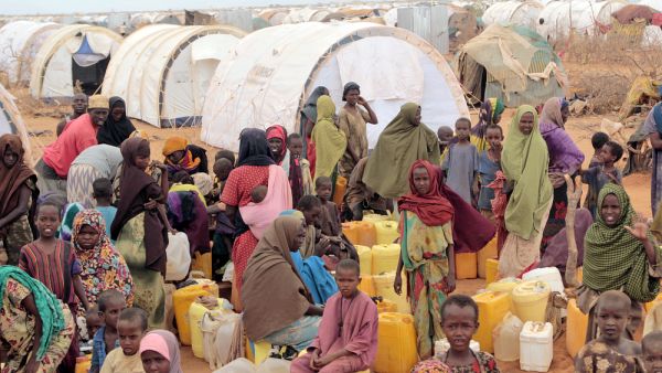 Refugee camp, hundreds of thousands of difficult conditions, Somali immigrants are staying. African people waiting to get in the water. (Shutterstock/ File Photo)