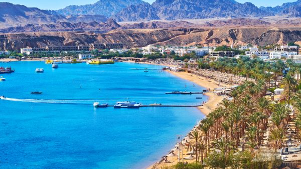 The comfortable sand beach line of El Maya bay, surrounded by giant rocky mountains, Sharm El Sheikh, Egypt. (Shutterstock/ File Photo)