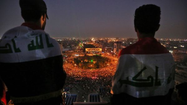 Iraqi protesters gather at Tahrir square during ongoing anti-government demonstrations in the capital Baghdad on October 31, 2019. Iraq's president vowed today to hold early elections in response to a month of deadly protests, but demonstrators said the move fell far short of their demands for a political overhaul. AHMAD AL-RUBAYE / AFP