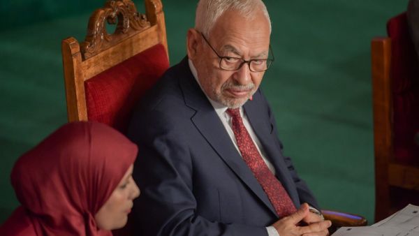 Tunisian Islamist-inspired Ennahdha party leader Rached Ghannouchi (R) chairs the first session of the new parliament following the October elections in the capital Tunis, on November 13, 2019. A collective oath by newly elected members of parliament was challenged by the leader of the Free Destourian Party (PDL), anti-Islamist lawyer Abir Moussi who wanted MPs to swear one by one, claiming some of them were not in the room at the time of the oath. It is the first clash on the floor of the Assembly between 