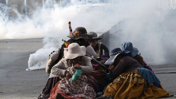 Bolivia's interim president Jeanine Anez said Friday that exiled ex-president Evo Morales would have to "answer to justice" over election irregularities and government corruption if he returns. ( AIZAR RALDES / AFP)