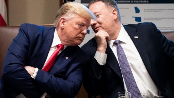 US President Donald Trump (L) listens to US Secretary of State Mike Pompeo during a Cabinet Meeting at the White House in Washington,DC. (AFP/ File Photo)