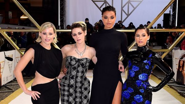 Kristen accessorised her look with a collection of chunky silver padlock