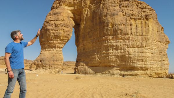 A man "stroked" the rock formation known as the Elephant Rock in Al Ula, Saudi Arabia. (Shutterstock/ File Photo)