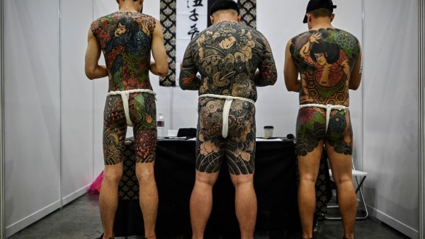 Malaysian officials slammed a tattoo exhibition held in the country as "porn" unsuitable for a Muslim-majority country, after images of half-naked men and women went viral (AFP)