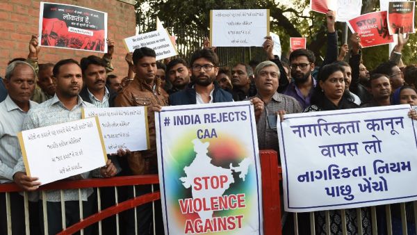 Protesters take part in a rally against India's new citizenship law outside the Gandhi Ashram in Ahmedabad on December 17, 2019. Fresh protests against India's new citizenship law erupted December 17 as alleged police brutality fuelled fury against the legislation which critics say is anti-Muslim. SAM PANTHAKY / AFP
