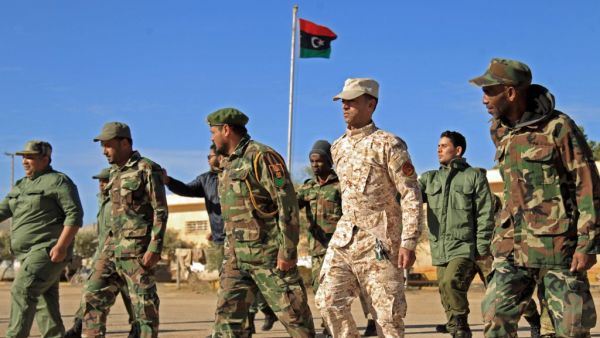 Fighters of a military battalion loyal to Libyan General Khalifa Haftar march during the morning assembly in the eastern city of Benghazi on December 18, 2019. Abdullah DOMA / AFP