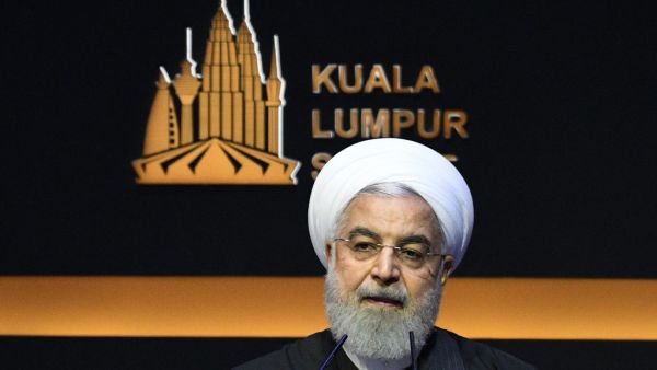 Iran's President Hassan Rouhani delivers his speech during the opening ceremony of the Kuala Lumpur Summit 2019 in Kuala Lumpur on December 19, 2019. Mohd RASFAN / AFP