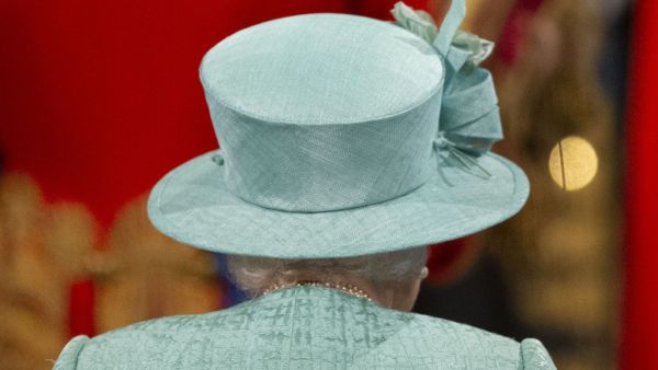 Britain's Queen Elizabeth II walks through the Royal Gallery, after delivering the Queen's Speech, during the State Opening of Parliament at the Houses of Parliament in London on December 19, 2019. The State Opening of Parliament is where Queen Elizabeth II performs her ceremonial duty of informing parliament about the government's agenda for the coming year in a Queen's Speech. Matt Dunham / POOL / AFP