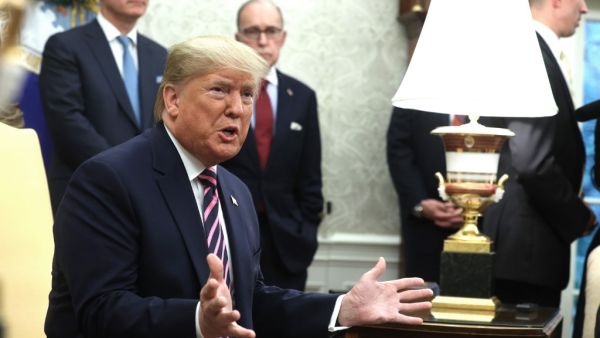 U.S. President Donald Trump speaks to members of the media during a meeting with President of Paraguay Mario Abdo Benitez in the Oval Office of the White House December 13, 2019 in Washington, DC. AFP/ File