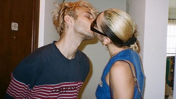 Dua Lipa looked more loved-up than ever with boyfriend Anwar Hadid as she shared a snap of the pair passionately kissing on Instagram on Friday (Instagram)
