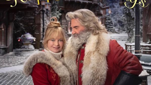 The streaming service shared a photo Friday featuring Russell, 68, as Santa, and Hawn, 74, as Mrs. Clause. (Twitter)