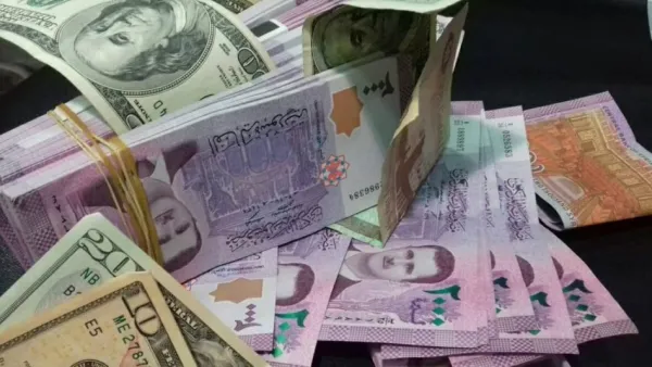 الأسد يصدر مرسوما تشريعيا يحدد عقوبة كل من يتعامل بغير الليرة السورية