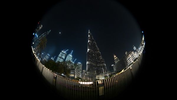 A picture taken with a fisheye lens shows Dubai's Burj Khalifa, the world’s tallest building, ahead of celebrations marking ten years since its construction, on January 4, 2020. Giuseppe CACACE / AFP