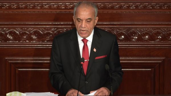 Tunisia's Prime Minister-designate Habib Jemli addresses parliamentarians during a plenary session in the capital Tunis, on January 10, 2020, for a confidence vote on his proposed cabinet line-up. Jemli unveiled on January 2, a proposed government composed of independent figures, after months of negotiations between political parties to fill positions failed. The cabinet of 28 ministers, most of whom are unknown to the general public, including four women, needs to receive parliamentary assent. FETHI BELAID
