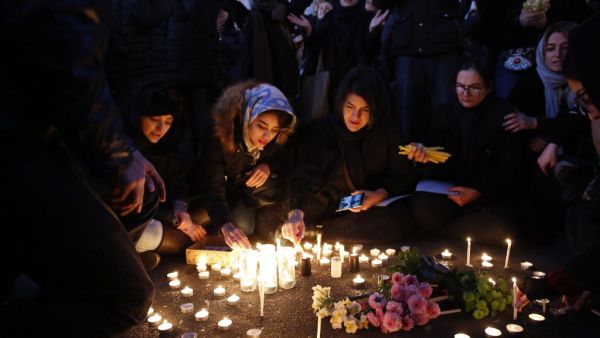 Iranians light candles for the victims of Ukraine International Airlines Boeing 737 during a gathering in front of the Amirkabir University in the capital Tehran, on January 11, 2020. (AFP/ File Photo) Iranians light candles for the victims of Ukraine International Airlines Boeing 737 during a gathering in front of the Amirkabir University in the capital Tehran, on January 11, 2020. (AFP/ File Photo)