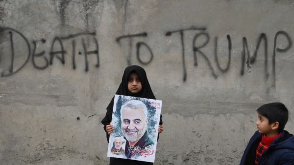 A Shiite Muslim girl holds a poster of Iranian commander Qasem Soleimani as she takes part in a anti-US protest against the killing of top Iranian commander Qasem Soleimani in Iraq, in Lahore on January 12, 2020. (AFP/ File Photo)