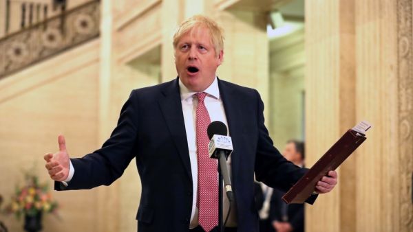 Britain's Prime Minister Boris Johnson speaks to members of the media in the Great Hall inside Parliament Buildings, the seat of the Northern Ireland Assembly, on the Stormont Estate in Belfast on January 13, 2020.  (AFP/ File Photo)