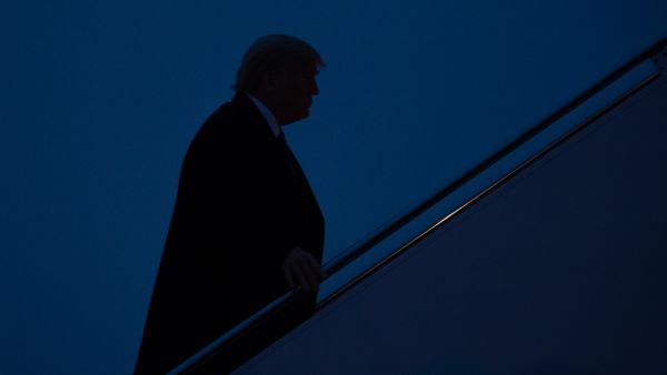 US President Donald Trump boards Air Force One prior to departure from Joint Base Andrews in Maryland, January 14, 2020, as he travels to hold a "Keep America Great" campaign rally in Milwaukee, Wisconsin. SAUL LOEB / AFP
