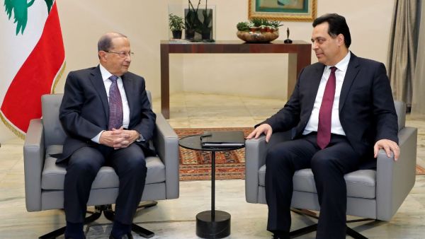 Lebanon's President Michel Aoun (L) meets with prime minister designate Hassan Diab at the presidential palace in Baabda, east of the capital Beirut, on January 21, 2020. AFP