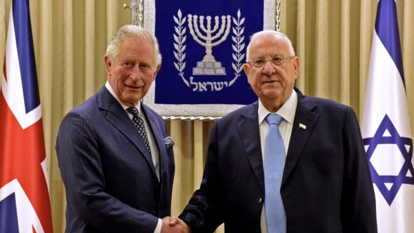 Britain's Prince Charles (L) shakes hands with Israeli President Reuven Rivlin at the presidential residence in Jerusalem, ahead of a meeting on the sidelines of the Fifth World Holocaust Forum at the Yad Vashem Holocaust memorial museum in Jerusalem on January 23, 2020. AFP