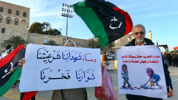 Libyans take part in a demonstration against eastern strongman Khalifa Haftar, and in support of the UN-recognised government of national accord (GNA), in the Martyrs' Square in the GNA-held capital Tripoli on January 24, 2020. AFP