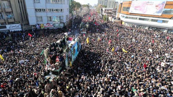 Iranian mourners gather for the burial of slain top general Qassem Soleimani in his hometown of Kerman on Tuesday. (AFP/ File Photo)