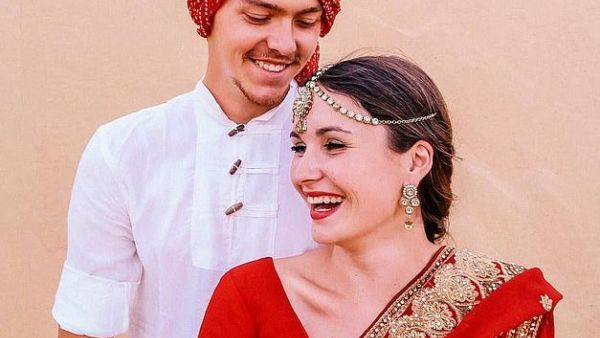 The couple, who have been together since 2013, said they put their plans  for a family on hold in order to travel (pictured in India)  (Dailymail/ Ella Geiger)