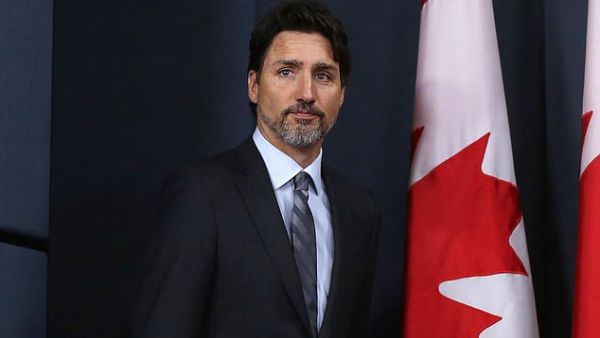 Canadian prime minister Justin Trudeau (pictured) has today blamed the US 'escalation' in the Middle East for the Iranian shoot-down of a passenger jet. (AFP)