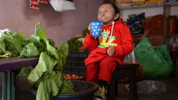 Khagendra Thapa Magar (pictured), 27, who measured 2ft 2.41ins, died on Friday at a hospital in Nepal, his family said. He was the world's shortest man who could walk (AFP/ File Photo)