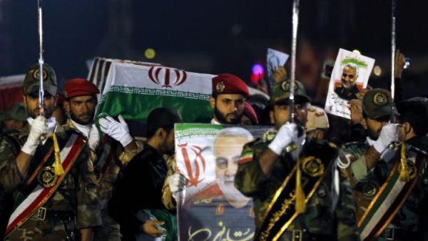 Military personnel carry the coffin of Iranian General Qasem Soleimani after his arrival at Ahvaz International Airport in southwestern Iran on January 5. Photo: Hossein Mersadi, AFP