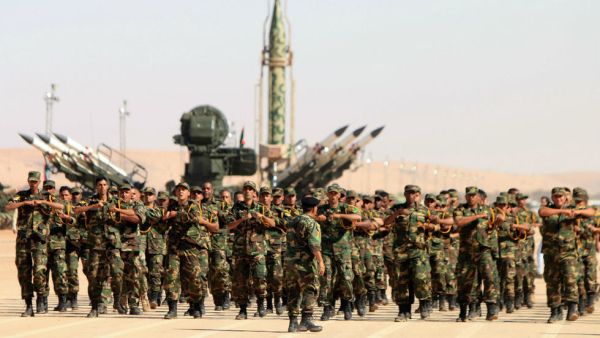 Soldiers from the self-styled army of Libyan Strongman Khalifa Haftar take part in a military parade in the eastern city of Benghazi on May 7, 2018. (Abdullah Doma / AFP)