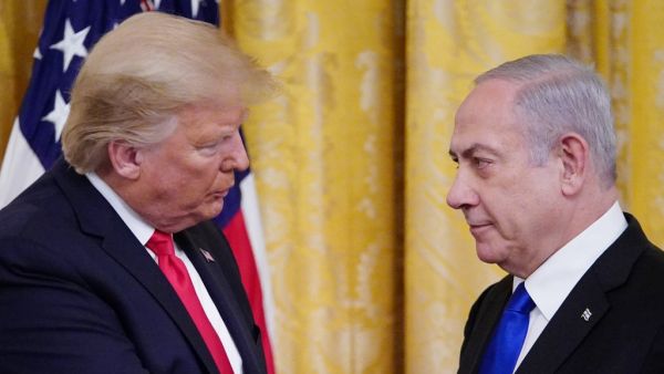 US President Donald Trump and Israel's Prime Minister Benjamin Netanyahu take part in an announcement of Trump's Middle East peace plan in the East Room of the White House in Washington, DC on January 28, 2020. Trump declared that Israel was taking a "big step towards peace" as he unveiled a plan aimed at solving the Israeli-Palestinian conflict. "Today, Israel takes a big step towards peace," Trump said, standing alongside Netanyahu as he revealed details of the plan already emphatically rejected by the Pa