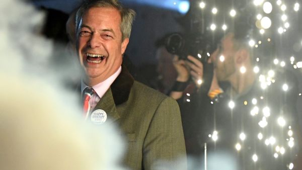 Brexit Party leader Nigel Farage smiles on stage in Parliament Square, venue for the Leave Means Leave Brexit Celebration as 11 O'Clock passes, in central London on January 31, 2020, the moment that the UK formally left the European Union. Brexit supporters gathered outside parliament on Friday to cheer Britain's departure from the European Union following three years of epic political drama -- but for others there were only tears. After 47 years in the European fold, the country leaves the EU at 11:00pm (2