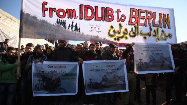 Syrians gather during a symbolic protest in the city of Harem in the rebel-held northern countryside of Syria's Idlib on the border with Turkey on February 2, 2020. AFP