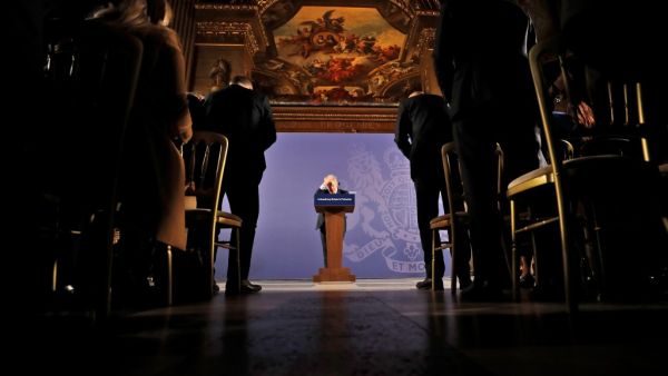 Britain's Prime Minister Boris Johnson reacts as he delivers a speech at the Old Royal Naval College in Greenwich, south east London on February 3, 2020. Britain on Monday said it wanted a "thriving trade and economic relationship" with the European Union, as it set out its position for future trade talks after it left the bloc. But Prime Minister Boris Johnson pledged: "We will not engage in some cut-throat race to the bottom. We are not leaving the EU to undermine European standards. We will not engage in